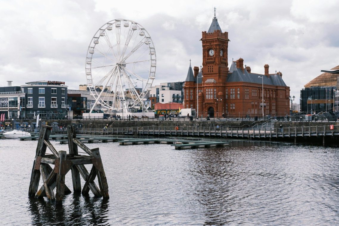 a photo of Cardiff Bay with the Norwegian church and fun fair in background